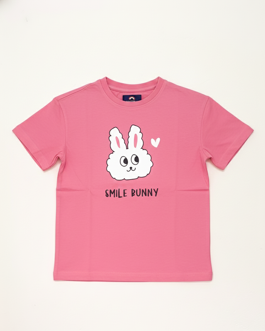 Pink t-shirt with a cartoon bunny design and 'Smile Bunny' text on a white background