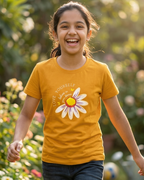 Girl wearing a Rust orange  T-shirt with Sunflower print
