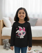 Girl wearing black rabbit T-shirt in minimalist bedroom background.