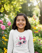 Girl wearing white rabbit T-shirt in garden background