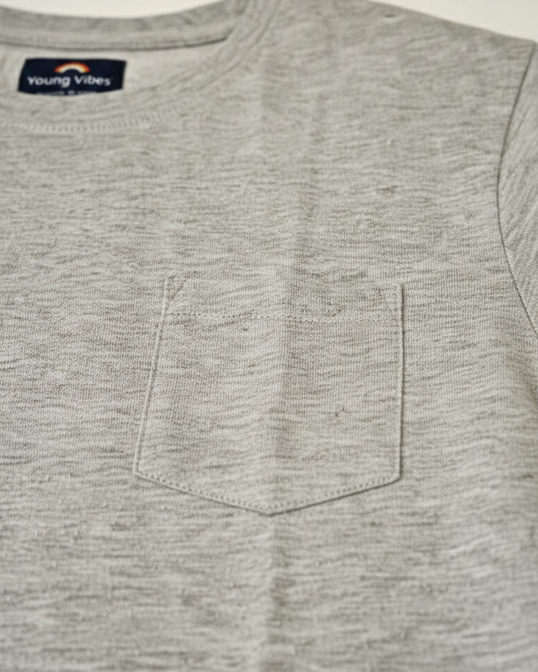 Gray t-shirt with a pocket and a visible brand logo on a light gray background