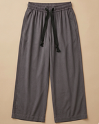 Grey Palazzo Pant placed on beige colour background