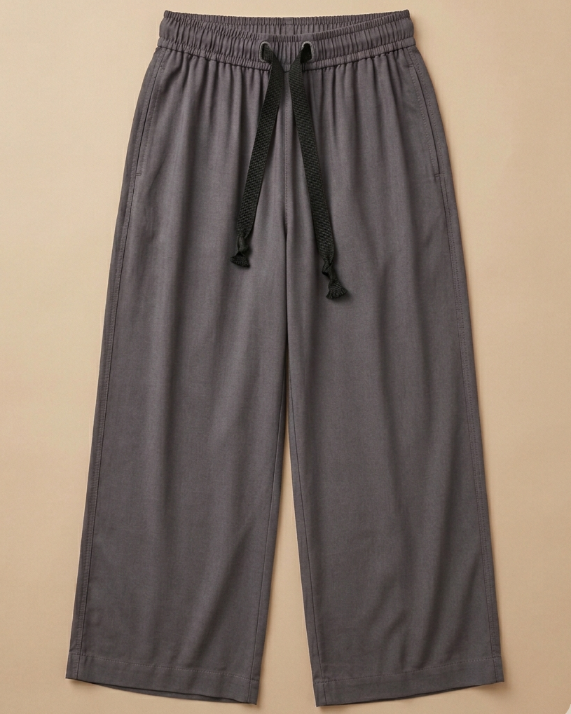 Grey Palazzo Pant placed on beige colour background