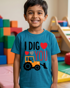 Kid in teal blue tshirt that says I dig you