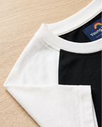 Kids Black with White Raglan Sleeve Cotton T-shirt focus on neck and sleeve part