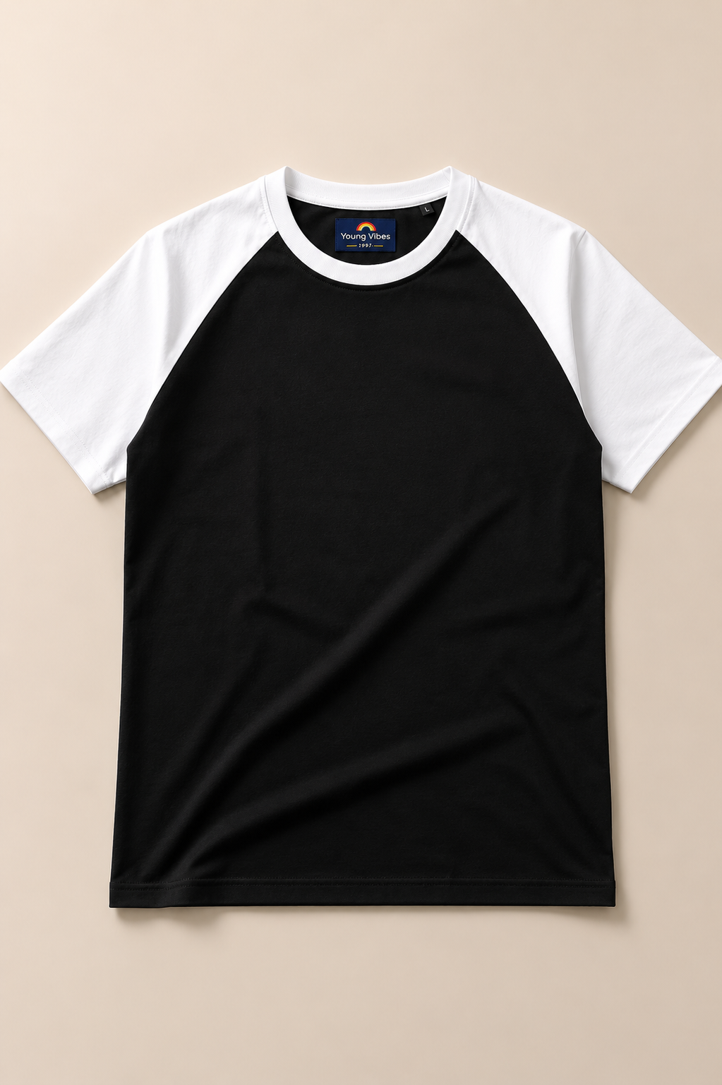 Kids Black with White Raglan Sleeve Cotton T-shirt Placed on lite beige background