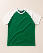 Kids Green with White Raglan Sleeve Cotton T-shirt Placed on lite grey background