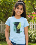 Girl wearing a Light Blue T-shirt with leave pattern 