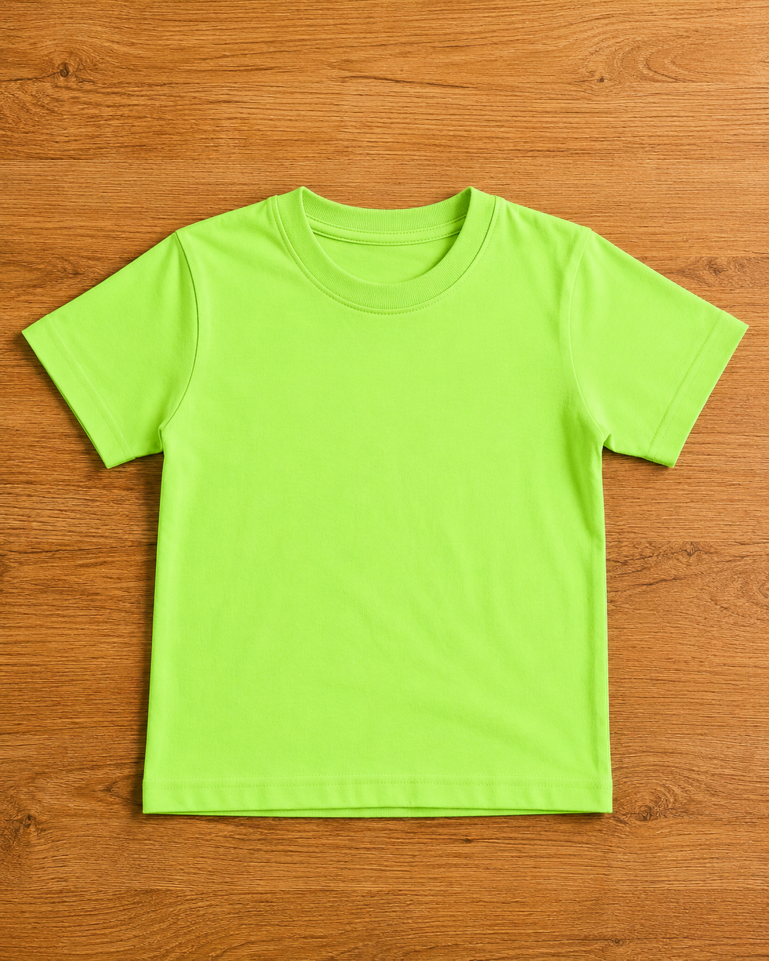 Light Lime Green T shirt  placed on the wooden background