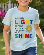 Boy wearing a Light blue T-shirt with colourful Little Light print close view