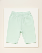 Light green shorts on a white background