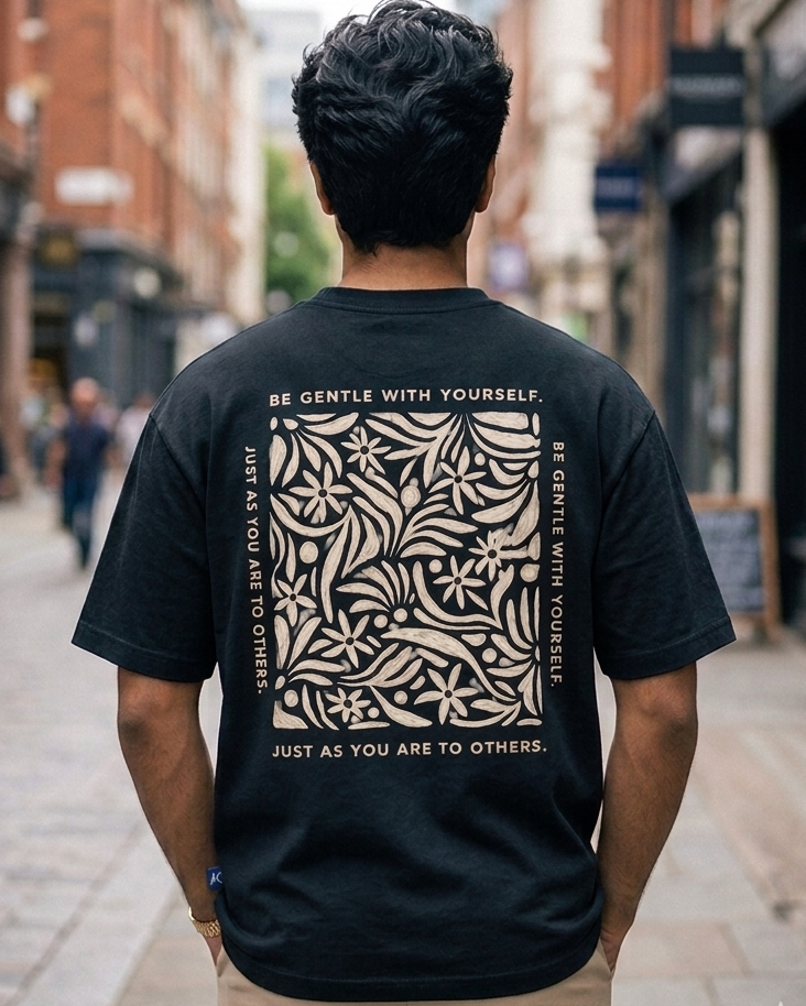 Man wearing Be Gentle print in Black Oversized T-shirt
