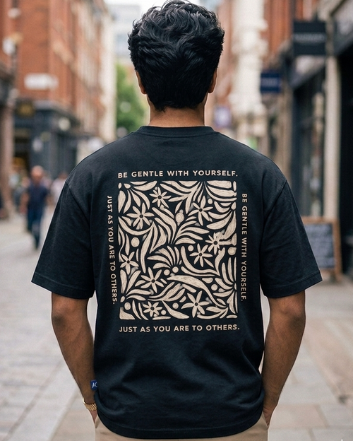 Man wearing Be Gentle print in Black Oversized T-shirt