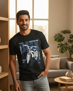 Man wearing a black t-shirt with a bicycle graphic in a living room.