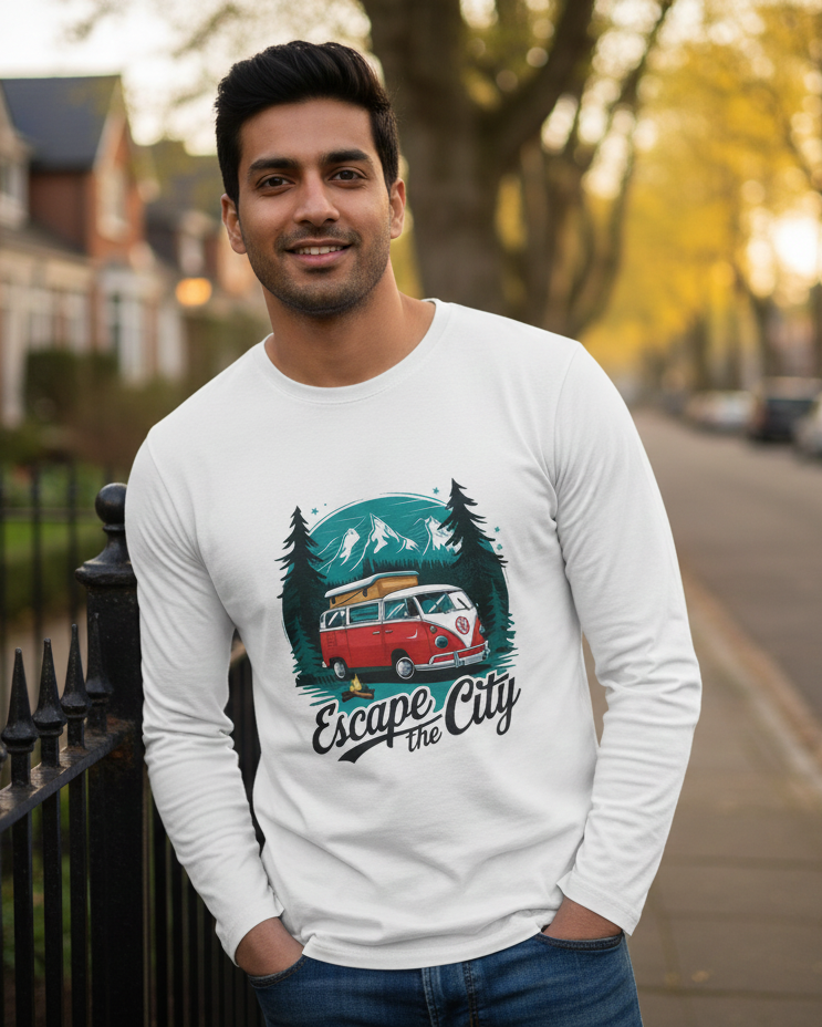 Man wearing a white sweatshirt with an 'Escape the City' design, standing on a street.