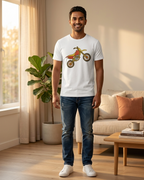 Man wearing a white t-shirt with a graphic design of a dirt bike in a living room.
