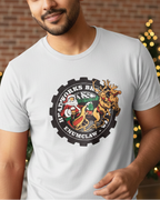 Man wearing a white t-shirt with a logo in front of a brick wall with Christmas decorations.