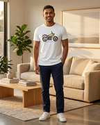 Man wearing a white t-shirt with a motorcycle graphic in a living room
