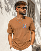 Young man wearing Feather embroidered Brown Regular Fit T-shirt