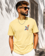 Young man wearing Feather embroidered Cream Regular Fit T-shirt