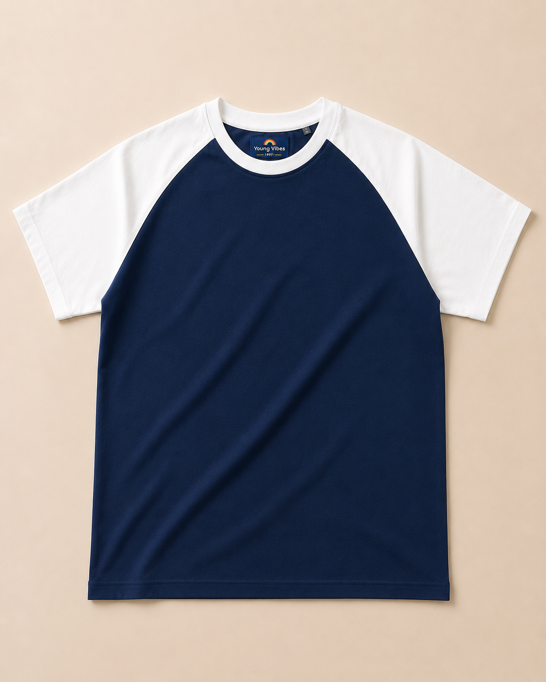 Navy Raglan Sleeve T-Shirt and placed on lite beige background