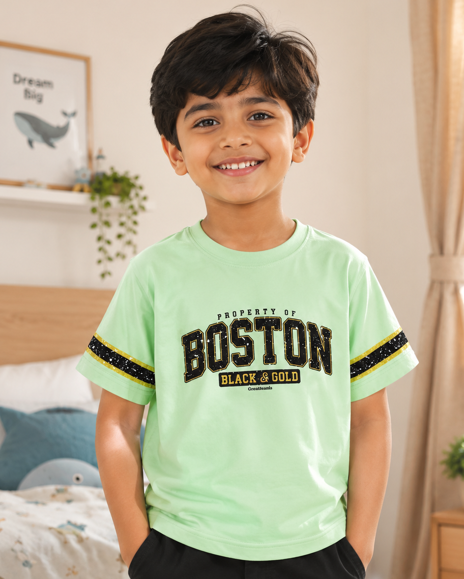Boy wearing a Pastel Green kids T-shirt with Boston print design