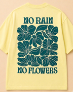 Pastel Yellow floral print Back view of  Oversized T-Shirt mock up placed on the Light Beige Background