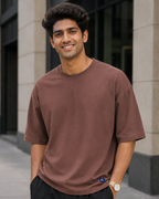 Young Man wearing a Plain Brown Oversized T-shirt