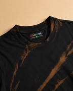 Ray-Burst Acid Wash Tee Regular fit placed on the beige background 