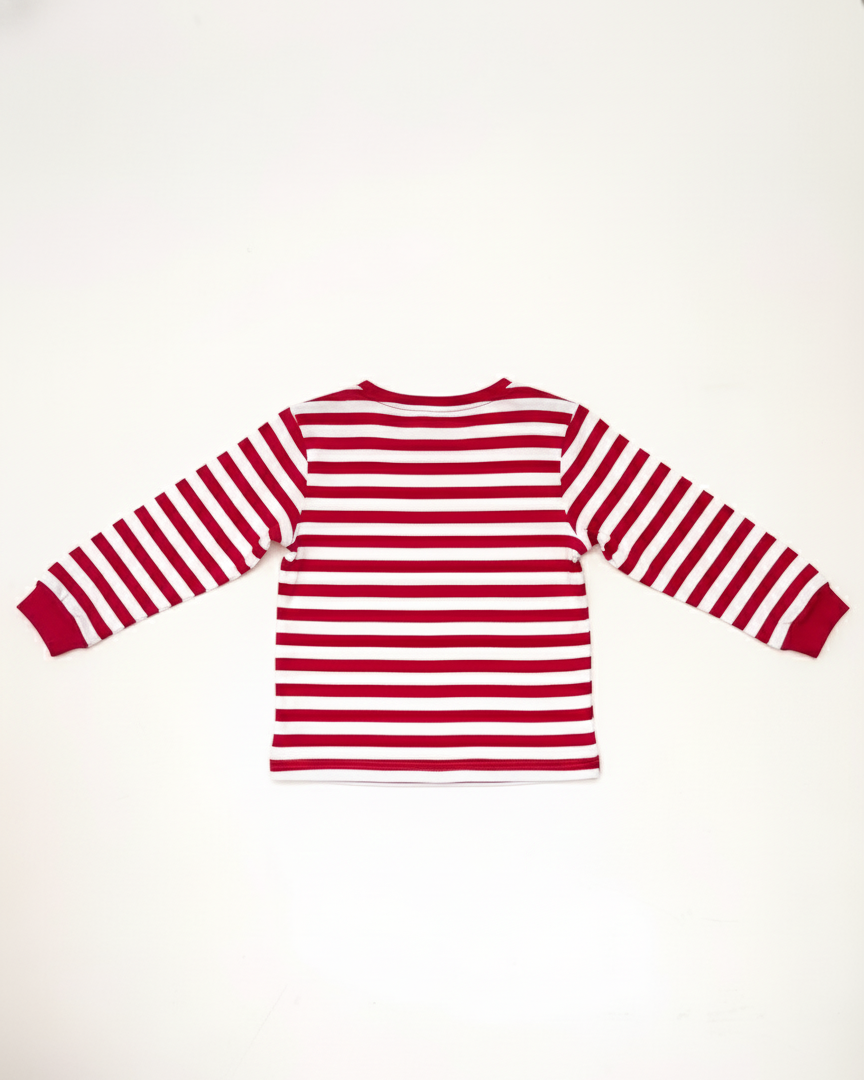 Red and white striped long-sleeve shirt on a light beige background