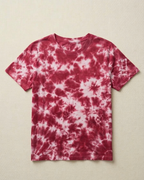 Red and white tie-dye t-shirt on a beige background