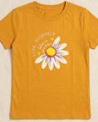 Rust orange  T-shirt with Sunflower print placed on the light beige background