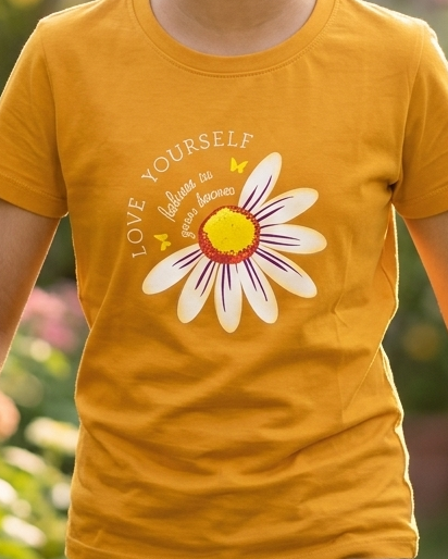 Girl wearing a Rust orange  T-shirt with Sunflower print close view