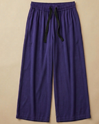 Tacao Purple Palazzo Pant placed on beige colour background