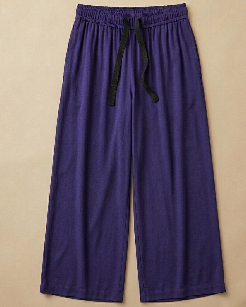 Tacao Purple Palazzo Pant placed on beige colour background