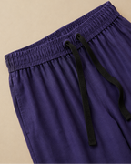 Taco Purple Palazzo Pant closeup view placed on beige background