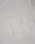 White shirt with a pocket on a light gray background
