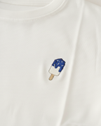 White sweatshirt with a blue and white popsicle design on a white background