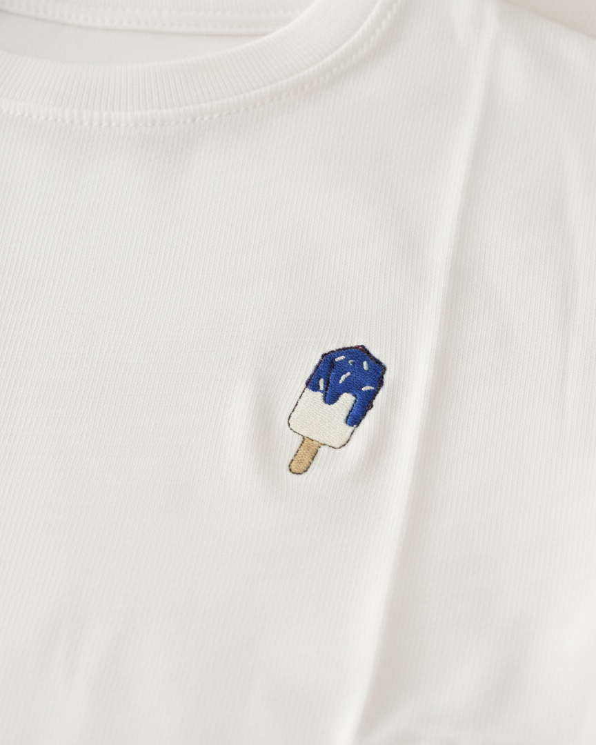 White sweatshirt with a blue and white popsicle design on a white background