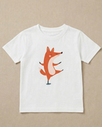 White t-shirt with a fox graphic on a beige background