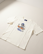 White t-shirt with a graphic design of a bear on a skateboard and text 'Happy Skater' on a light gray background.