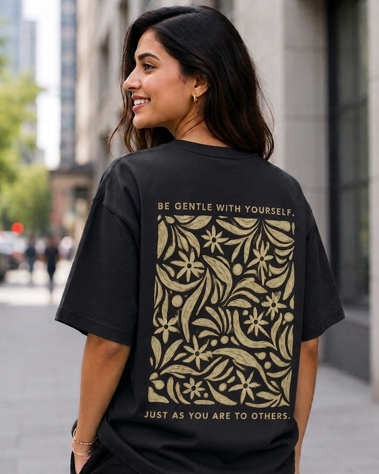 Woman wearing Be Gentle print in Black Oversized T-shirt