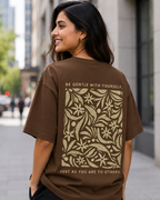 Woman wearing Be Gentle print in Brown Oversized T-shirt