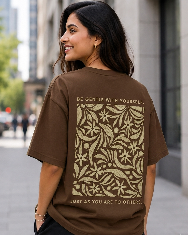 Woman wearing Be Gentle print in Brown Oversized T-shirt