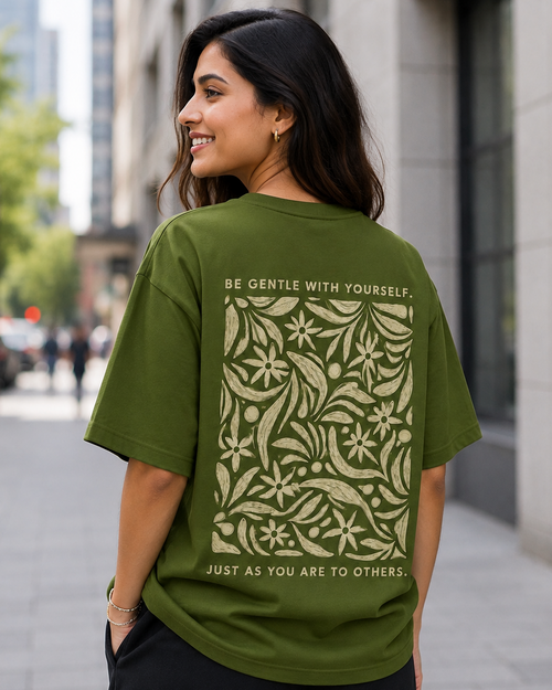 Woman wearing Be Gentle print in Olive Green Oversized T-shirt