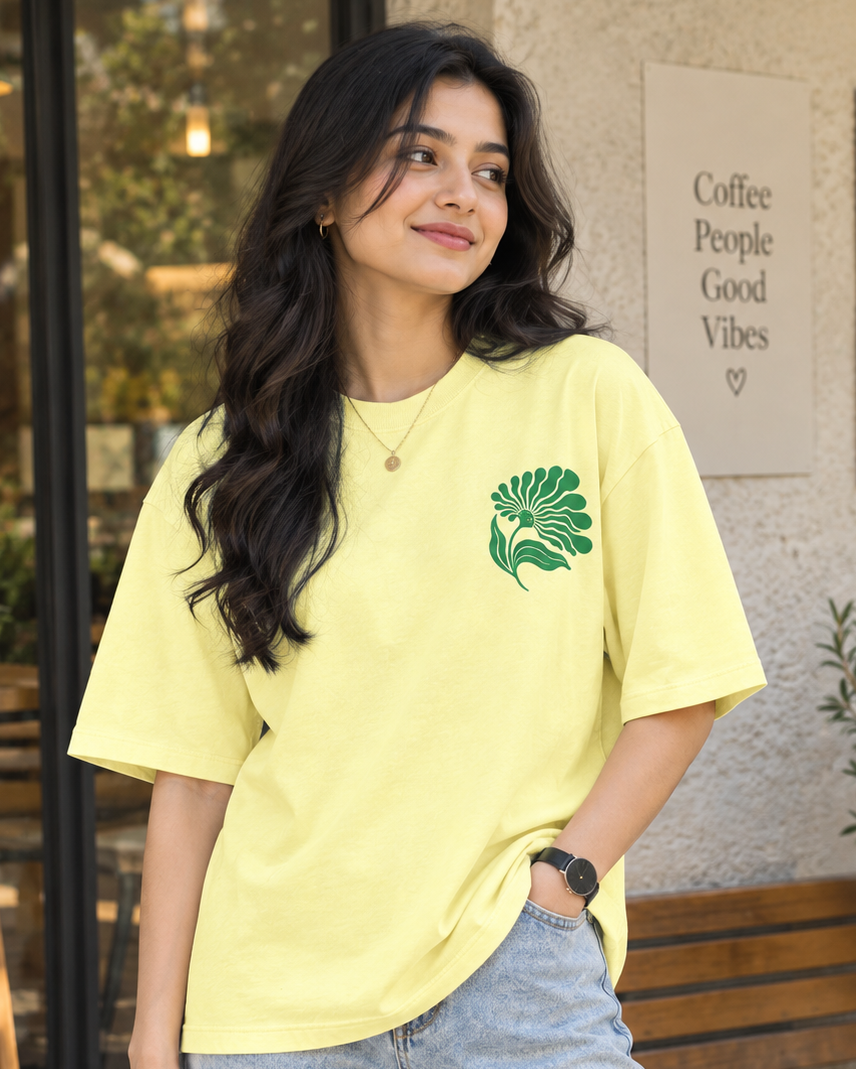 Woman wearing Green floral print in Cream Oversized T-shirt