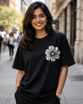 Woman wearing a No Rain No Forest Floral print Black Oversized T-shirt