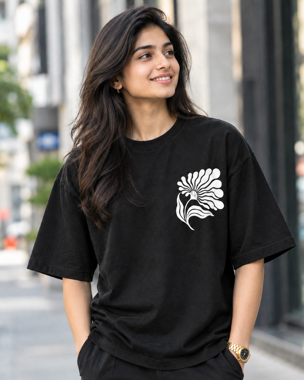 Woman wearing white floral print in Black Oversized T-shirt