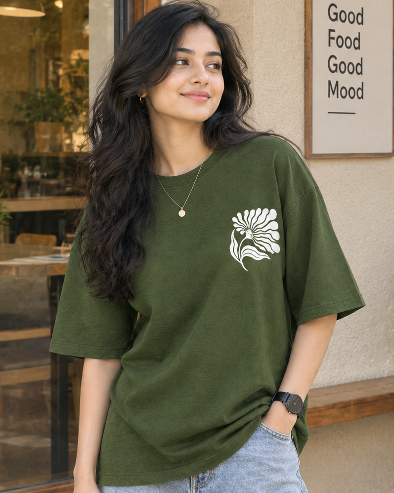 Woman wearing white floral print in Olive green Oversized T-shirt