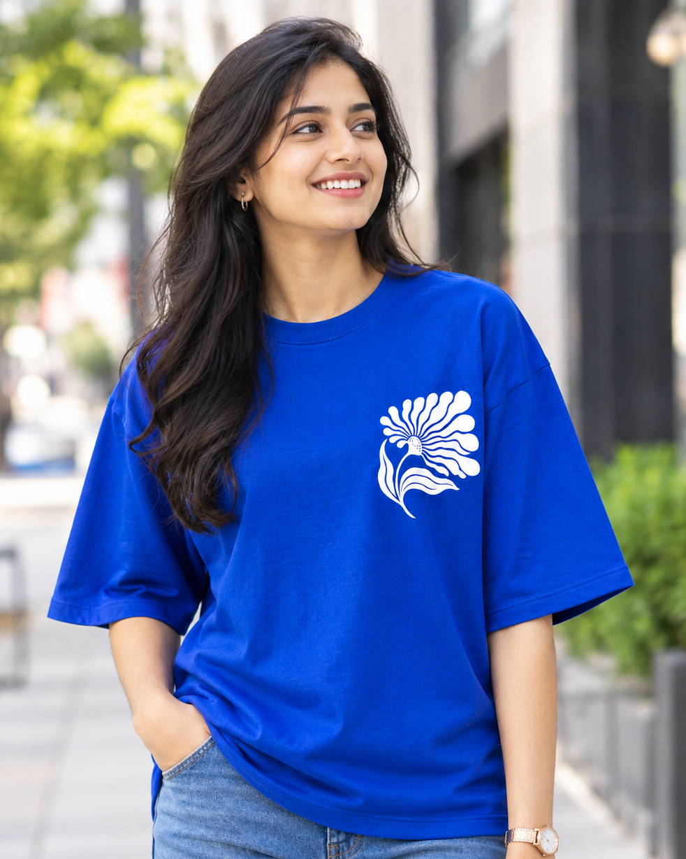Woman wearing white floral print in Royal Blue Oversized T-shirt